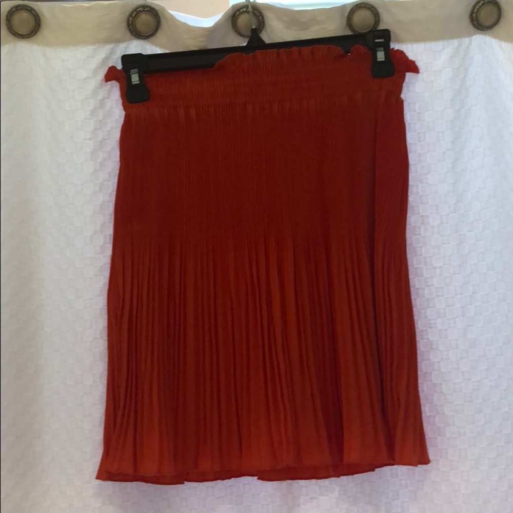 Orange accordion skirt